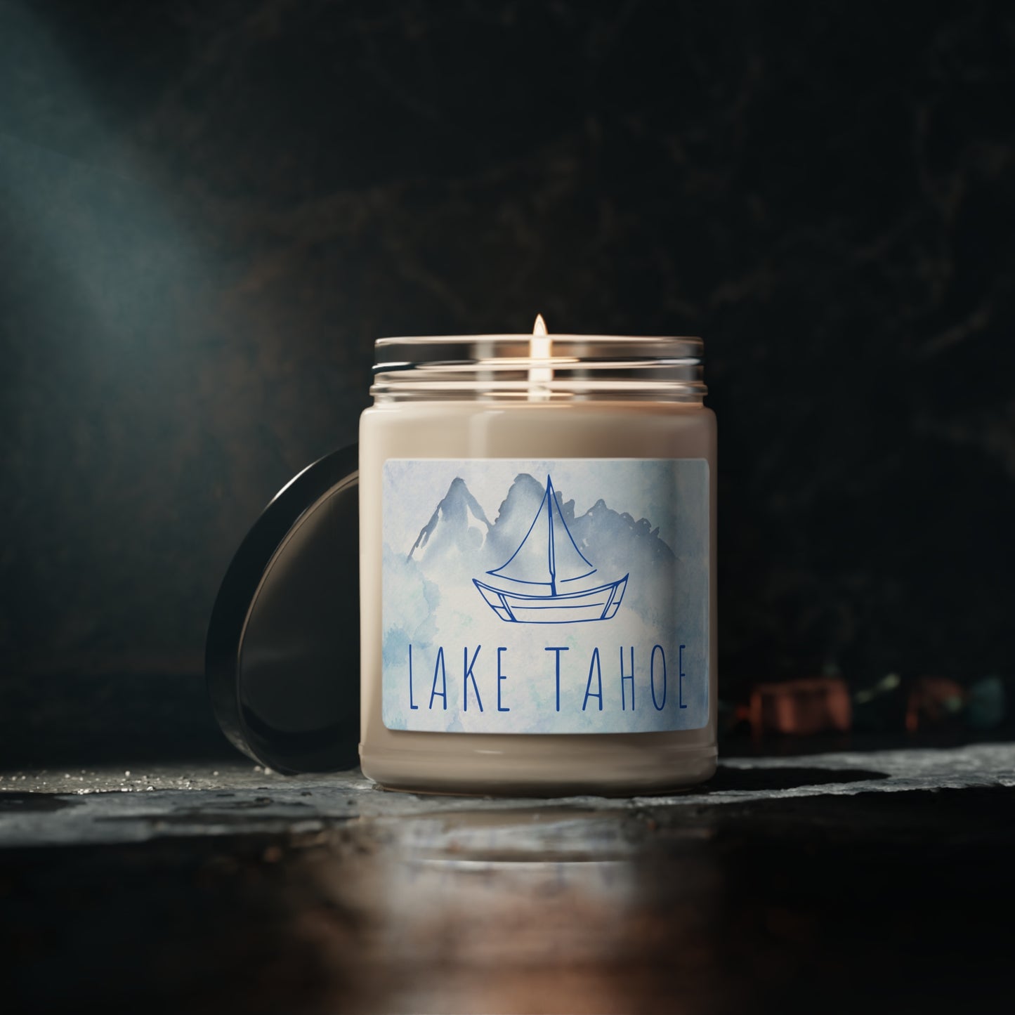 Lake Tahoe Sailboat candle in shades of blue watercolors