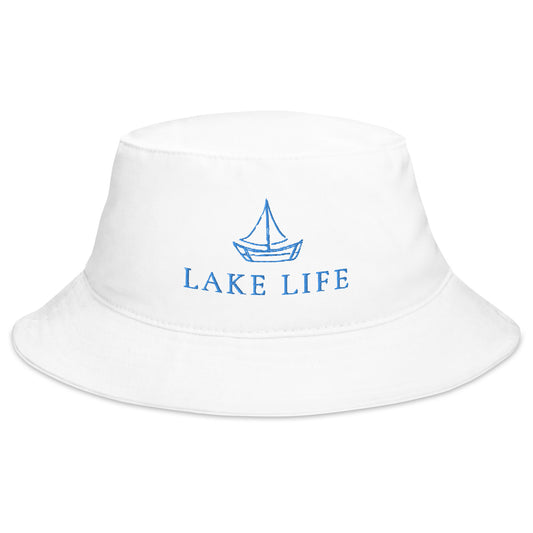 Lake Life Sailboat Bucket Hat, featuring a simple sailboat drawing in blue accompanied by the words Lake Life below the design