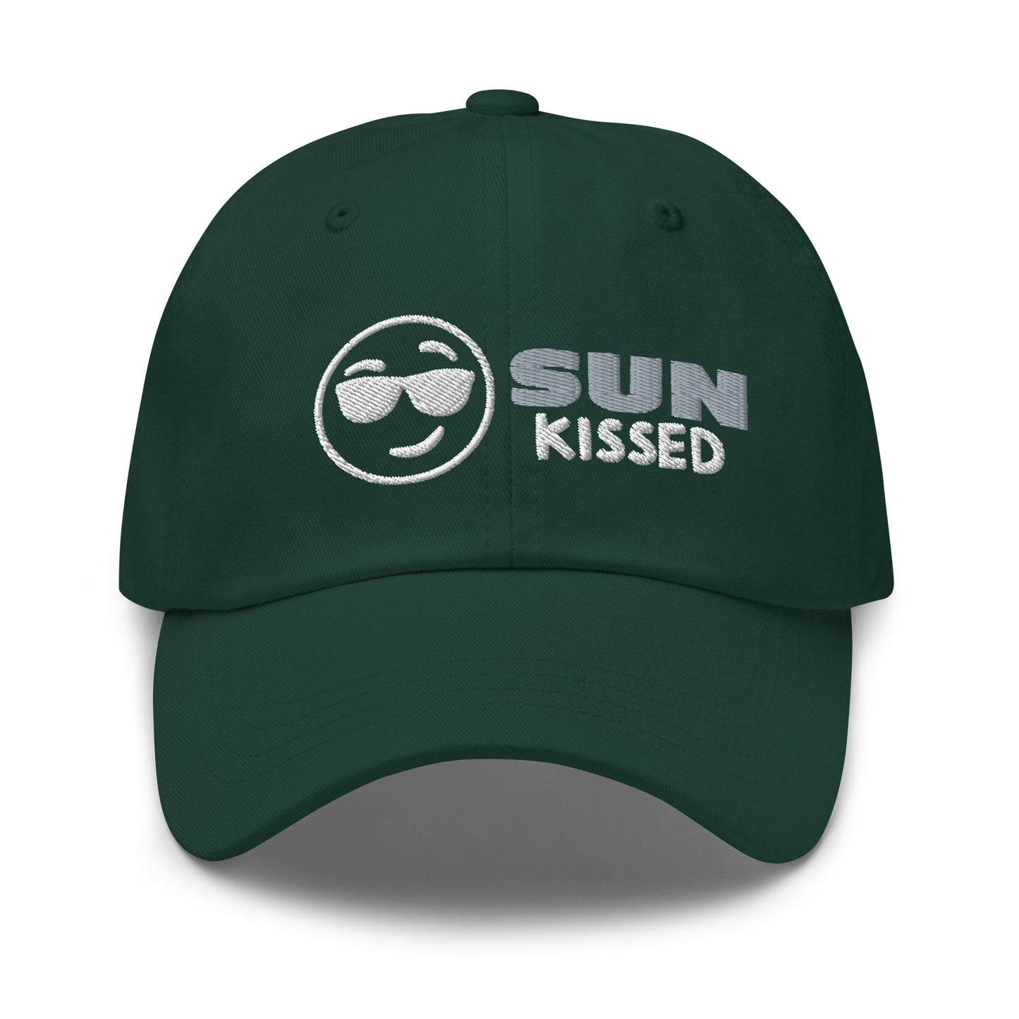 Sun Kissed Dad Hat, featuring an embroidered emoji face wearing sunglasses with grey and white lettering to the right of the design